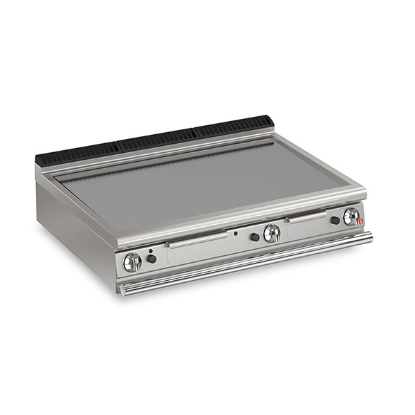 Baron 3 burner gas fry top with smooth mild steel plate and thermostat control.