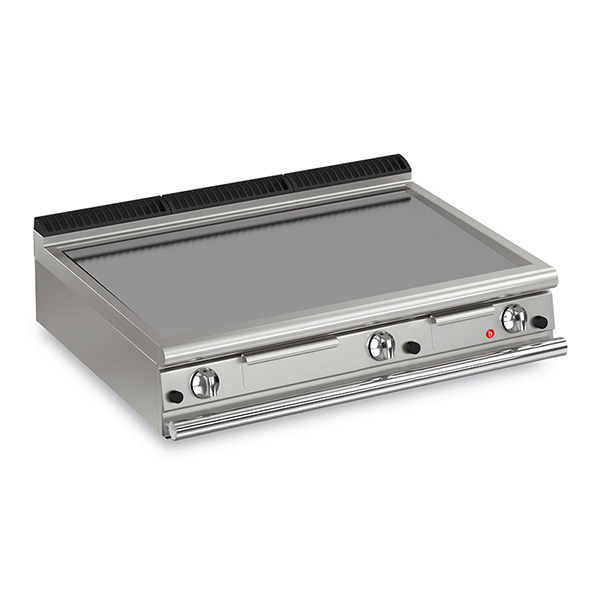 Baron 3 burner gas fry top with smooth mild steel plate and thermostat control.