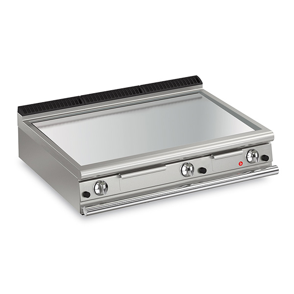 Baron 3 burner gas fry top with smooth chrome plate and thermostat control.